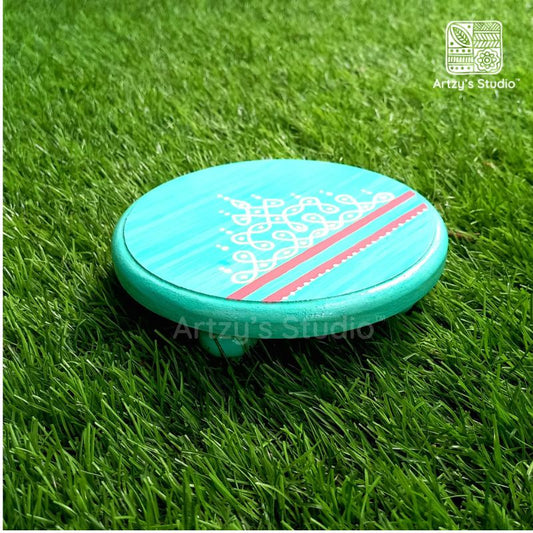 Handpainted small round wooden stand kolam design
